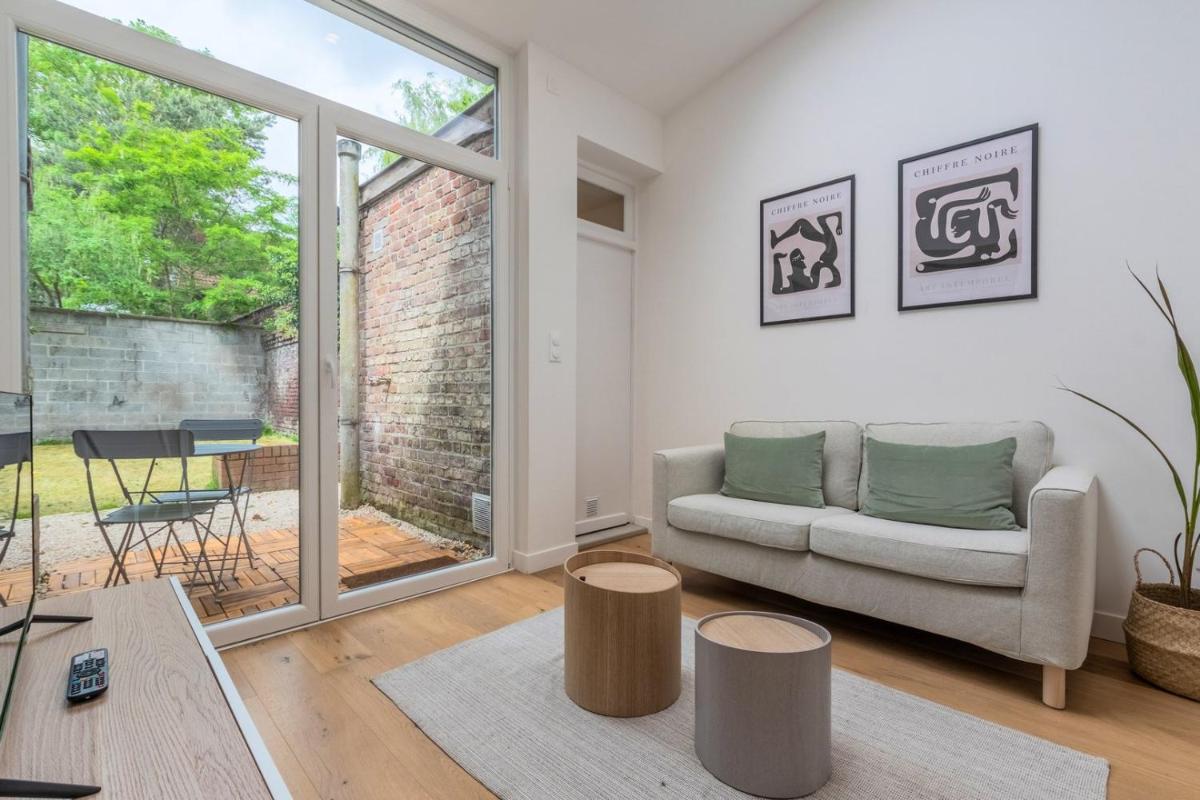 Appartement une chambre avec jardin, proche tram