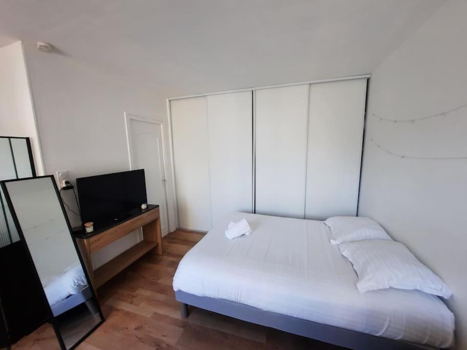 Courtépée : Apt 4 Prs avec balcon en centre ville