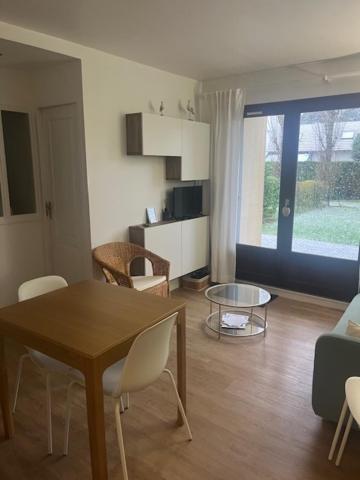 Appartement lumineux en rez-de- jardin