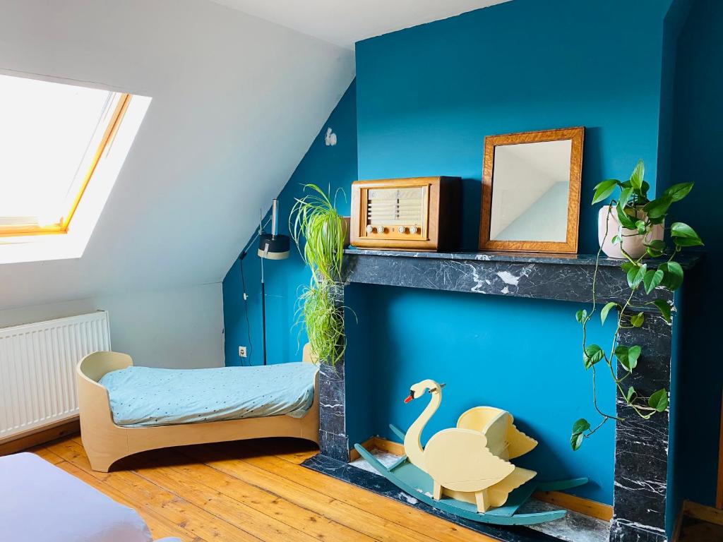 Blauwe kamer in herenhuis met 2X 1pers bed