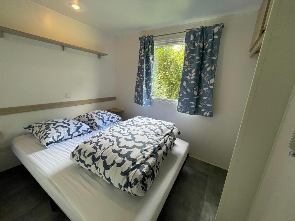 Chez Roger - Bungalow climatisé avec TV - 2 chambres 4 personnes