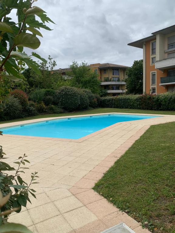 City Rose T2, Climatisation,parking privé, piscine, wifi , tout confort