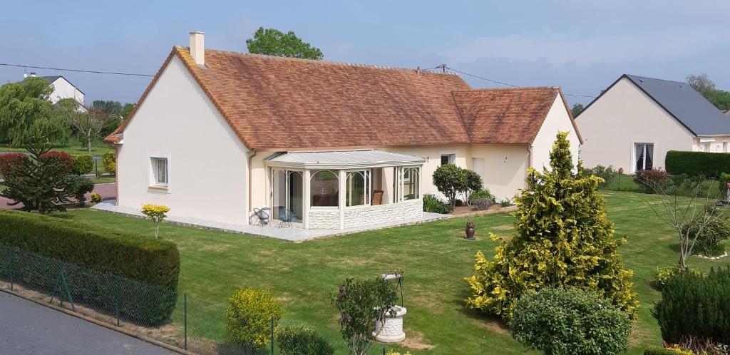 Gîte "Au P'tit Tourois" de plain-pied tout confort avec véranda proche d'Omaha Beach et de Bayeux accueillant les animaux