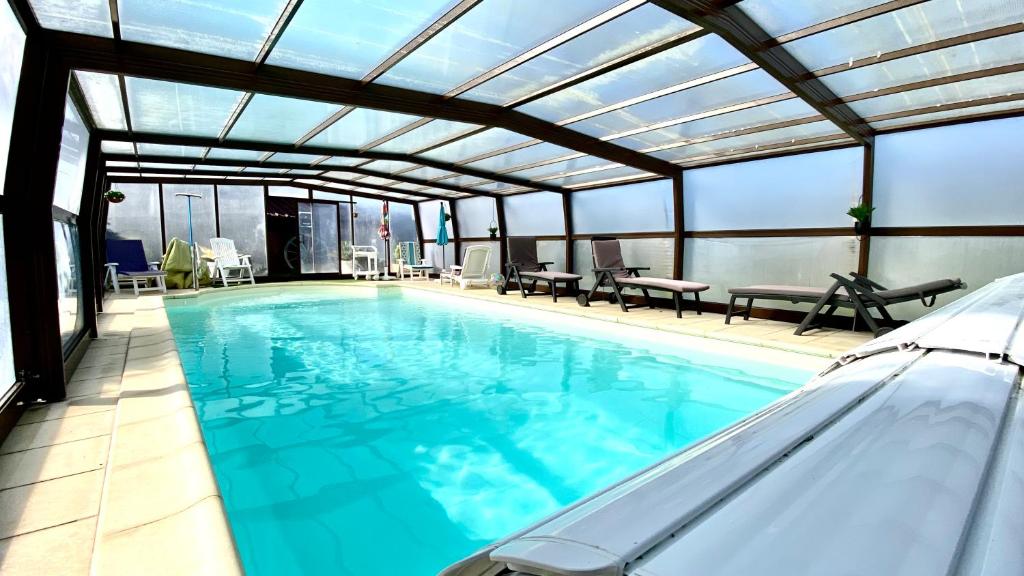 Maison de charme piscine couverte chauffée