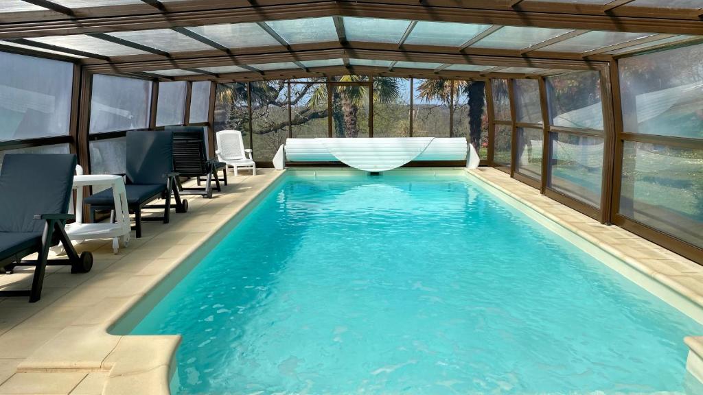 Maison coconing piscine couverte chauffée