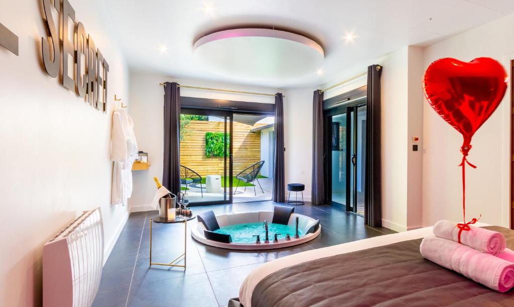 Le Secret - Nuit romantique avec Jacuzzi privatif - Champagne offert - Climatisation