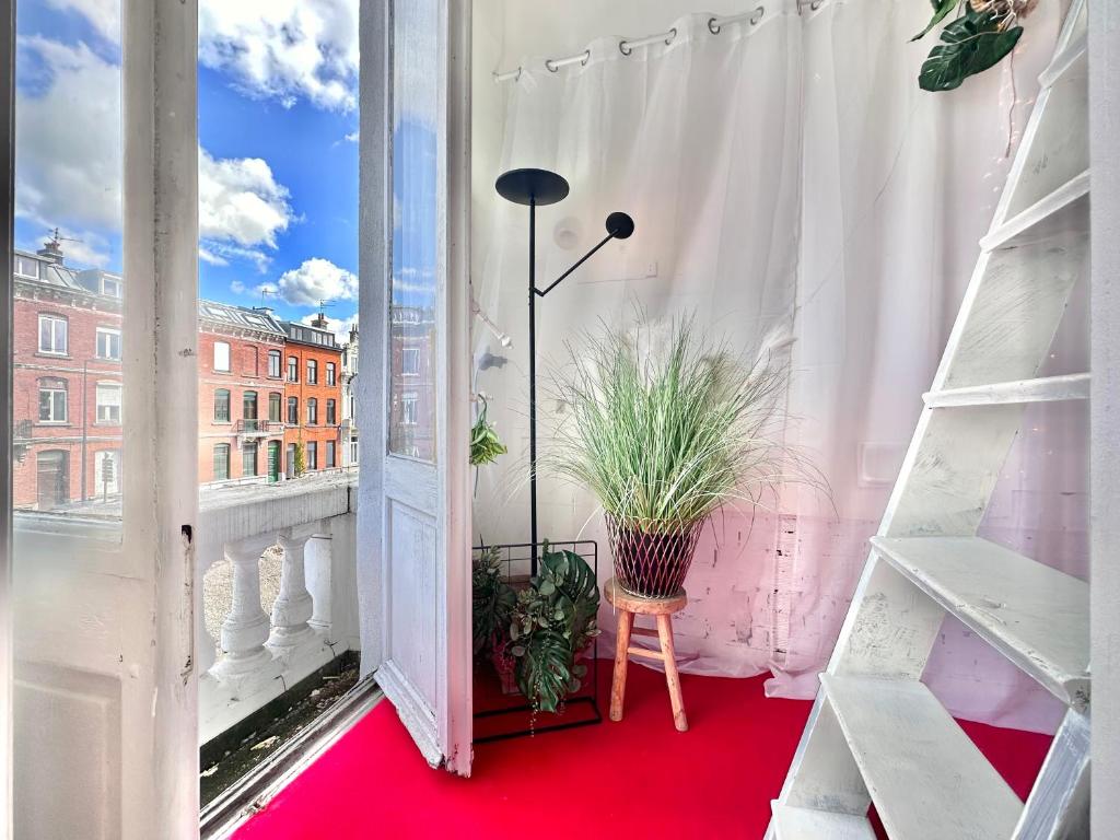 Espace nuit avec Balcon et lit Double en Mezzanine